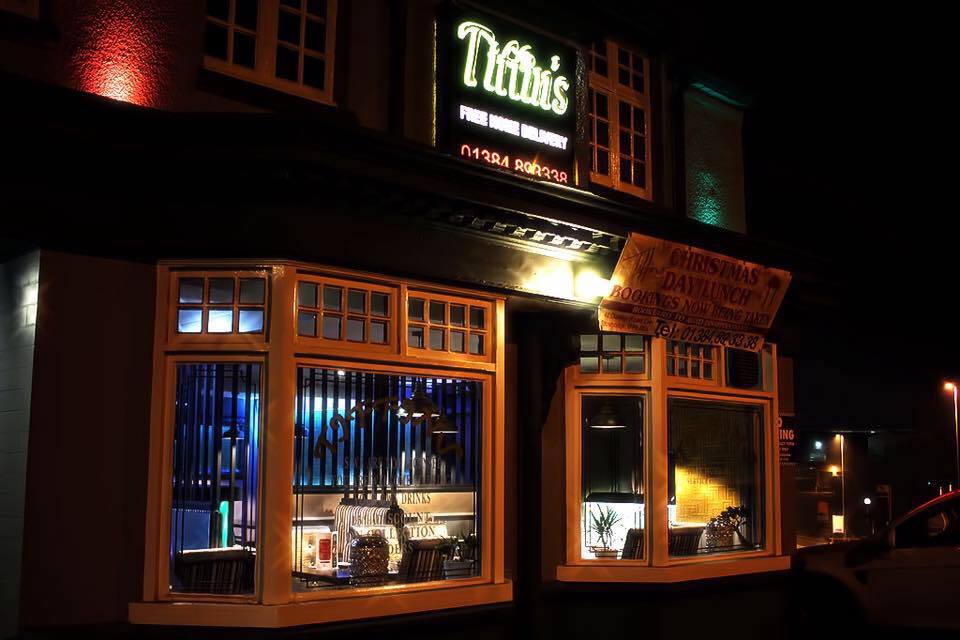 Tiffins lit up at night