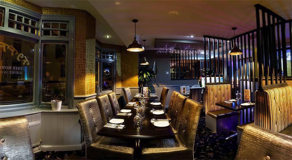 The full dining room with pendant lights